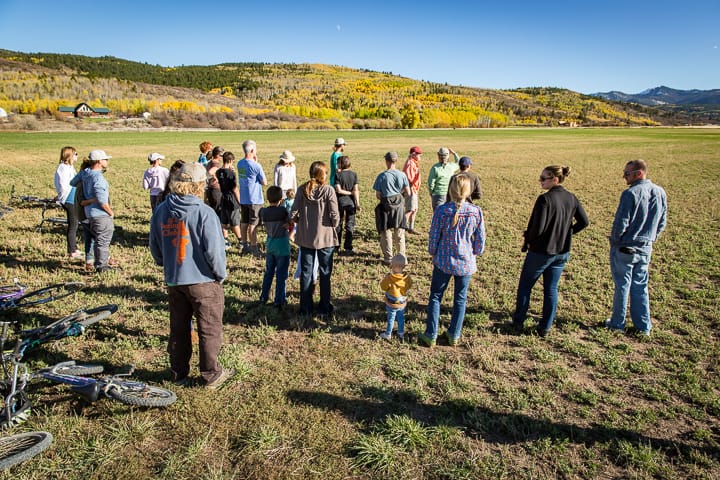 Eirka Eschholz and Ken Michael showing community members the wide open field and the new home of their Teton Full Circle Farm. Permanently protected as farmland forever.