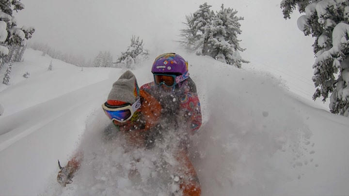Backcountry Curry Chicken Salad fuels dad and a kid riding in a backpack as they ski through deep powder snow with.
